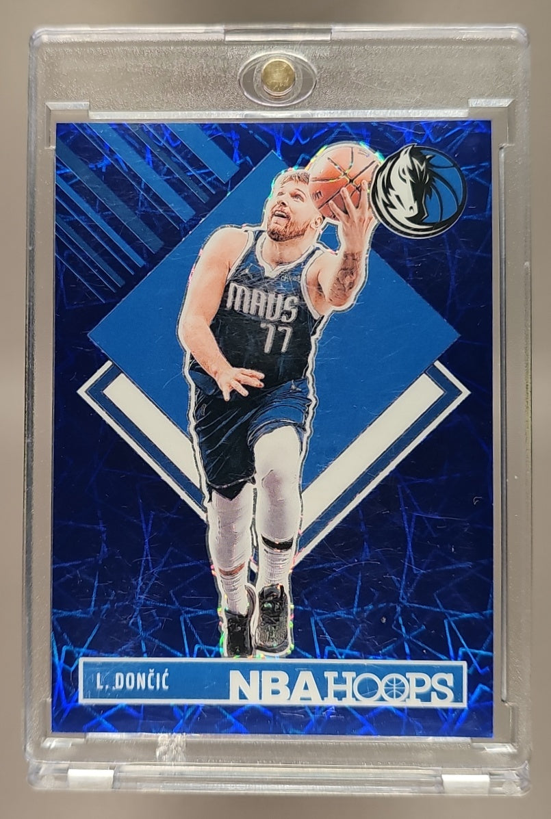 2024 Panini Hoops Luka Doncic #281 Lazer Blue Prizm Premium /49 Tribute image 0