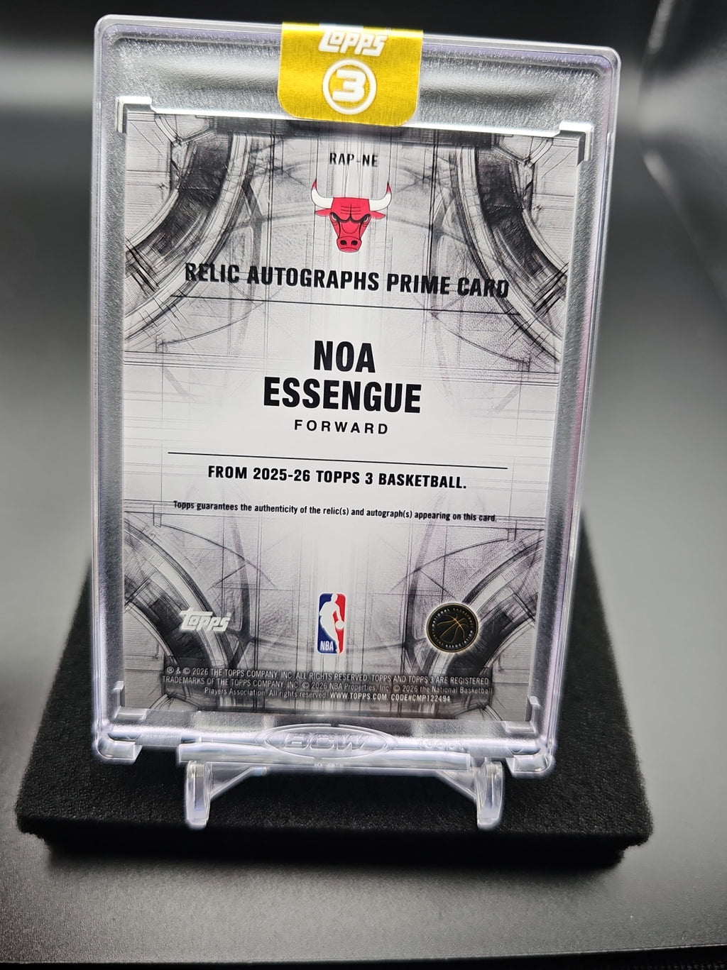 2025-26 Topps Three Noa Essengue #RAP-NE Relics Auto Prime 39/49 MEM RC Bulls image 1